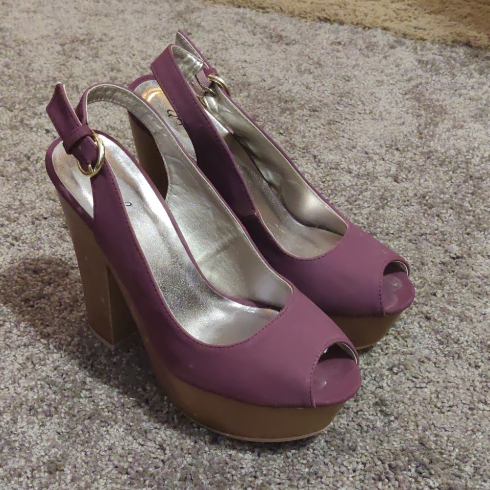 Platform peep toe slingbacks.